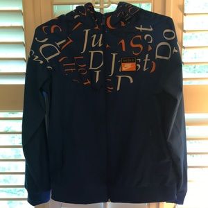 This is a Nike Boys Sportswear JDI Windbreaker